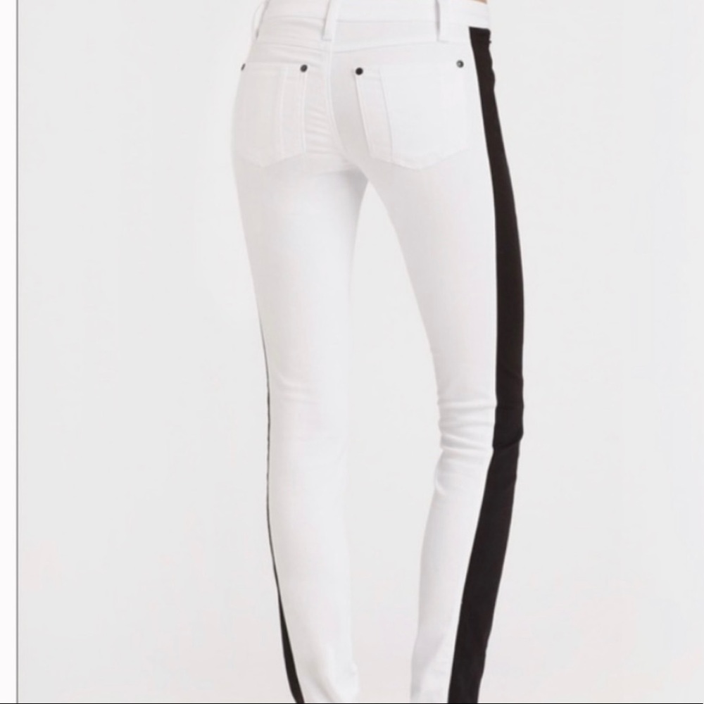 Alice & Olivia, super cute, white jeans with black stripe down the legs.